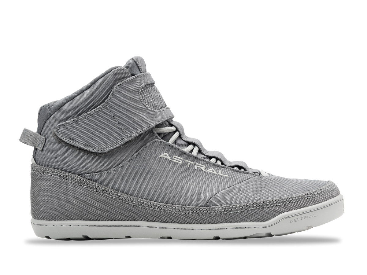 Astral Pigsah grey high-top water shoes with white laces and sole on a black background