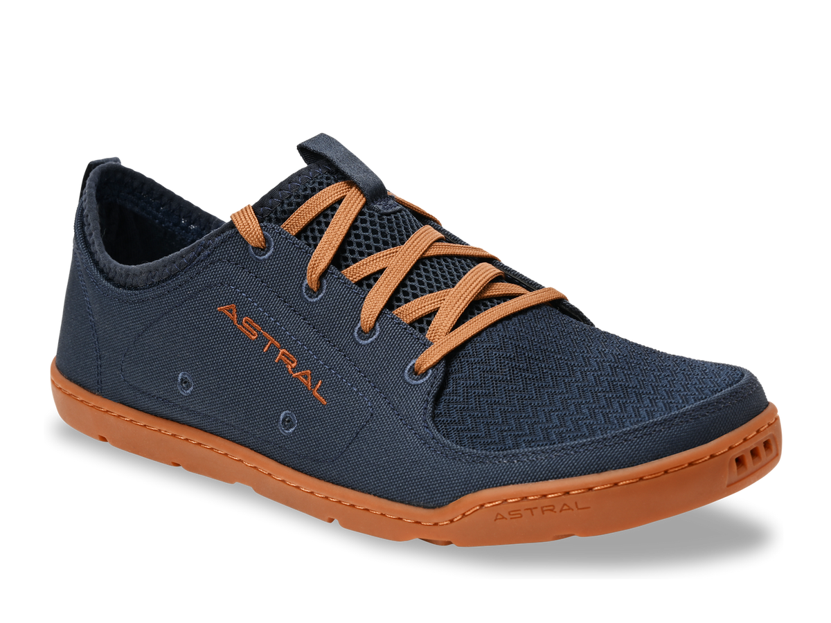 Astral LoyakM men's navy blue casual shoe with orange laces and a brown sole, designed for water and everyday wear.