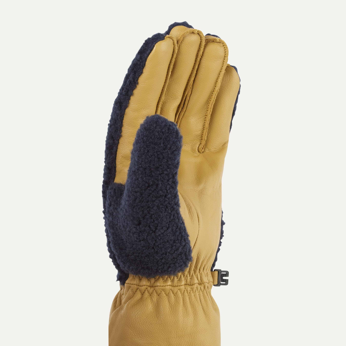 Sealskinz Garvestone Gloves, tan leather palm and fingers with navy fleece back, adjustable buckle at wrist.