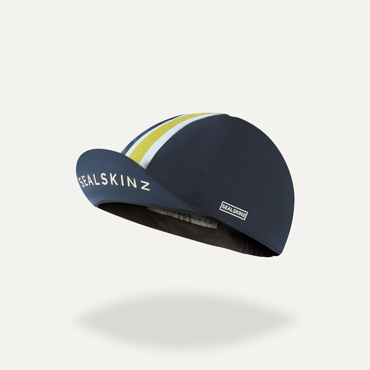Sealskinz dark blue cycling cap with yellow and white stripes on the top and Sealskinz logo on the brim and side.