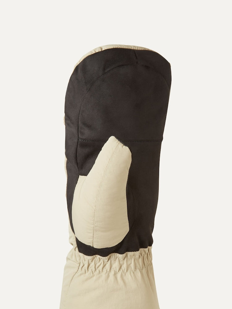 Sealskinz Langley Gloves: Close-up of a black and beige outdoor mitten, showing the elasticated wrist and back of the hand.
