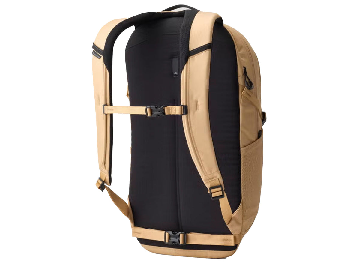 Gregory Signal 20 backpack, tan & black, rear view with padded back panel, adjustable shoulder straps, sternum, and waist straps.
