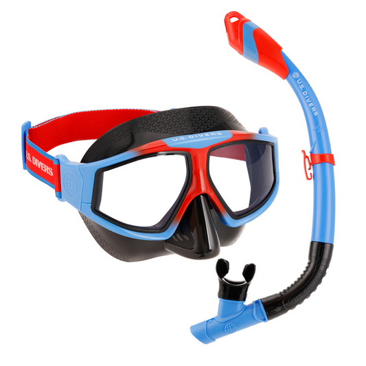 U.S. Divers red, blue, and black snorkel mask and snorkel set, isolated on white.