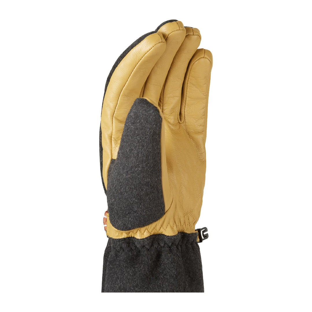 Sealskinz Toftwood Gloves. Close-up of a single glove, light brown leather with dark grey felt on the back and wrist.