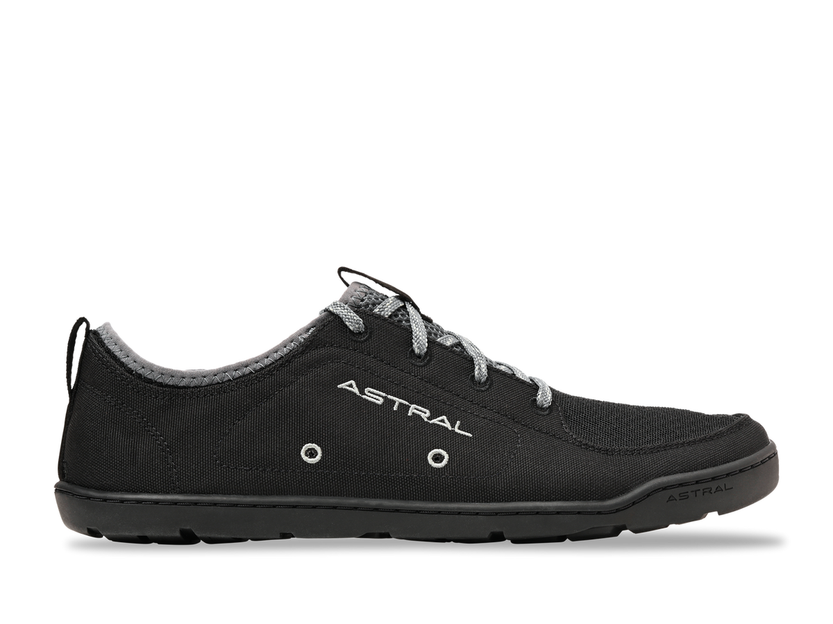 Astral Loyak black water shoe with grey laces, low-cut design. Perfect for boating, travel, and amphibious adventures.