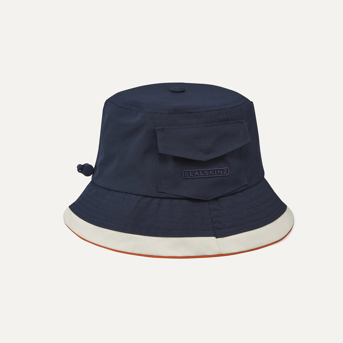 Navy blue Sealskinz Seething bucket hat with cream brim, orange trim, side pocket, and adjustable toggle.